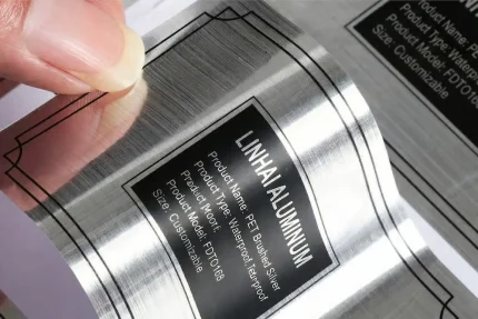 High-end brushed silver PET labels with realistic metal hairline texture for premium branding and equipment.