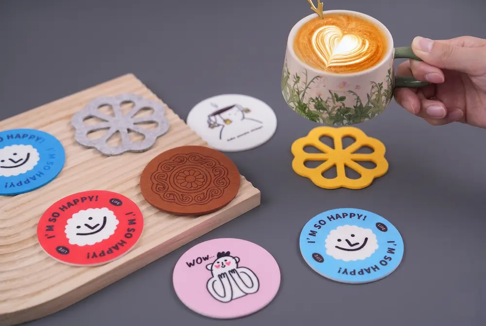 Custom absorbent polyester felt coasters with colorful printed logos, low MOQ personalized drink coasters for office and home.