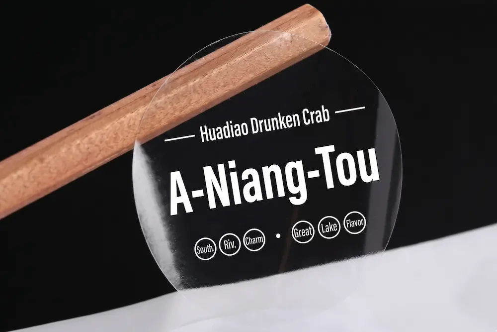 Premium ultra-clear transparent PET labels for a professional "no-label" look on cosmetic and food packaging.